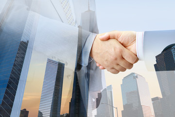Aufkleber - Closeup of handshake on urban background 