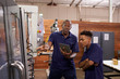 © Monkey Business - Engineer Training Young Male Apprentice On CNC Machine