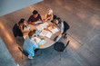 © Jacob Lund - Group of students sitting together at table