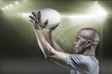 Poster - Composite image of athlete in position of throwing rugby ball 3D