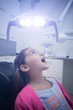 © WavebreakMediaMicro - Young patient sitting on dentists chair with mouth open