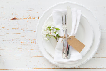 spring table setting with white flowers