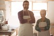 © WavebreakMediaMicro - Portrait of male and female potter standing with arms crossed