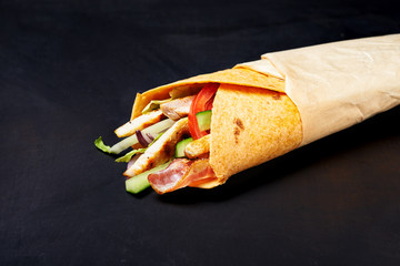 Wall Mural - wrapped sandwich with chicken in tortilla