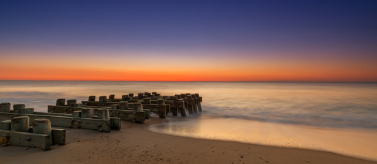 Seagirt pilings sunrise in New Jersey