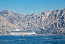 Cruise Liner Ship Swimming At Blue Adriatic Sea, Mountains Landscape