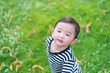 © pookpiik - Close-up little Asian boy looking up somewhere and thinking with
