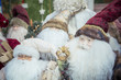 Figures of traditional Saint Nicolas in a Christmas market stall - Alsatian Christmas celebration - Christmas market in Central Europe: old fashioned Santa Claus puppet - Xmas vintage decorations