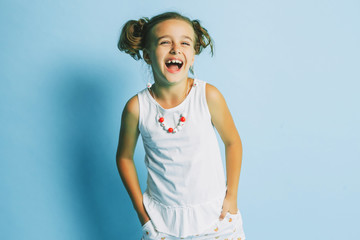 Girl with bright accessories on a blue background