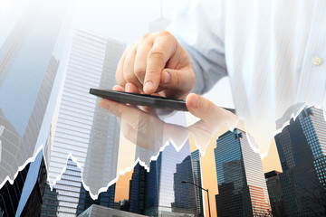 Poster - Close up of man using smartphone on urban background 