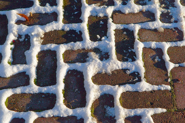 Paving in the snow.