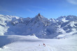On ski piste high in the mountains. Winter Alps landscape .