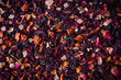 © pelinoleg - Mix tea with dried fruits and dried flowers. Tea background
