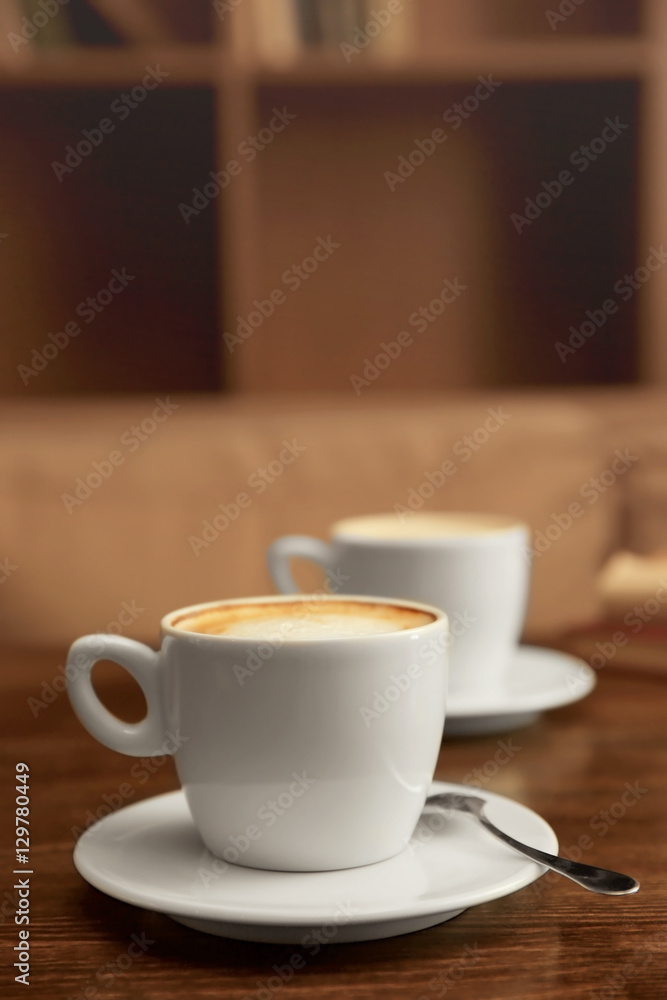 Cup of coffee on table