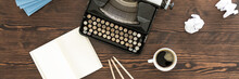 Desk With Old Typewriter And Coffee
