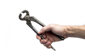 Old black tongs isolated on white background