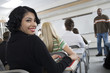 © MDBPIXS - Portrait of young college student with classmates attending lecture