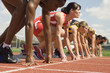 © moodboard - Group of diverse female runner getting ready to start the race