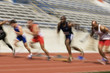 © MDBPIXS - Blurred motion of male athletes racing in stadium