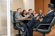 © MDBPIXS - Multiethnic business people applauding boss in office meeting