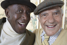 Closeup Portrait Of Cheerful Multiethnic Senior Men Smiling