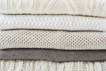 Stack Of Warm Knitted Sweaters