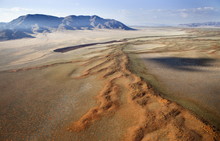 Aerial View From Hot Air Balloon Over Magnificent Desert Landscape Of Sand Dunes, Mountains And Fairy Circles, Namib Rand Game Reserve Namib Naukluft Park, Namibia