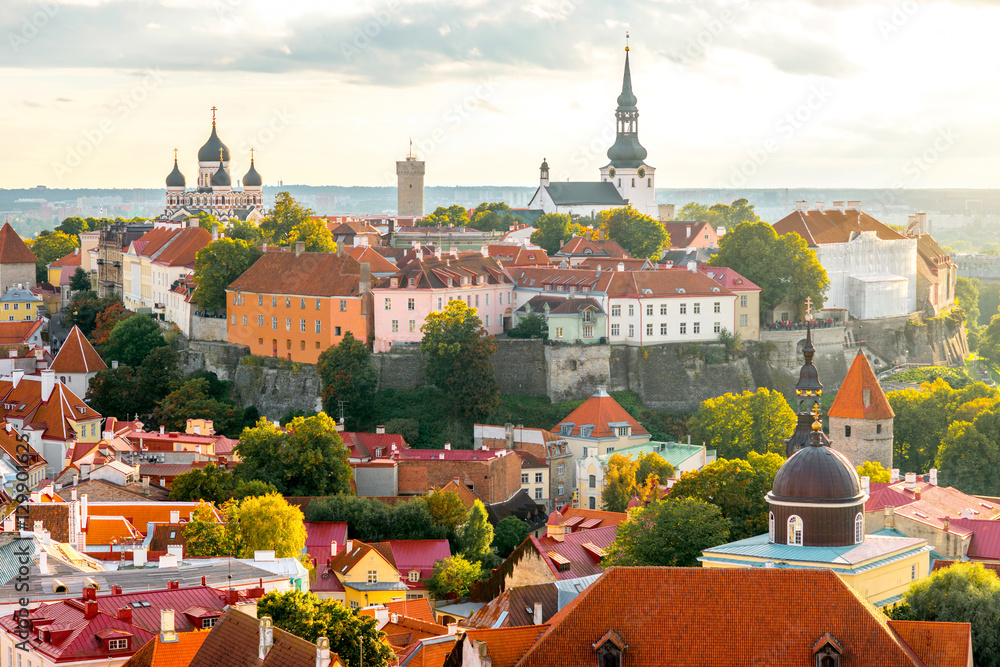 Aerial view from church tower on the old town of Tallinn on the sunset in Estonia - obrazy, fototapety, plakaty 