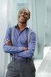 © mimagephotos - cool young black businessman smiling