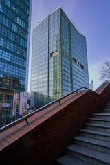 Poster - Stone staircase and modern office buildings in the city center to Poznan.