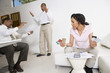 © MDBPIXS - Accountant in discussion with couple over excess credit card expenses