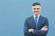 © ajr_images - Mature businessman smiling wearing classic suit