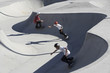 High angle view of friends skateboarding in park