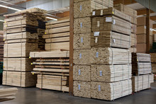 Stacks Of Plywood Piled Up In Warehouse