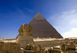 The famous ancient Egypt Cheops pyramid and sphinx in Giza