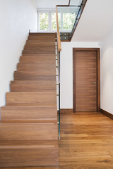 Wall Mural - View of wooden staircase and floor in house