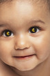 © moodboard - Euro symbol in baby boy's eyes