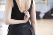 © MDBPIXS - Midsection rear view of ballerina practicing in rehearsal room