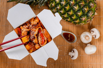 Wall Mural - Noodles in a white box on wooden background