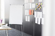 © MDBPIXS - Flip chart by sticky notepapers on wall in office