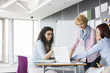 © MDBPIXS - Businesswomen working together in creative office