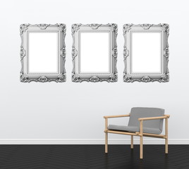 3d interior rendering of interior scene with fabric armchair and three blank Baroque picture frames