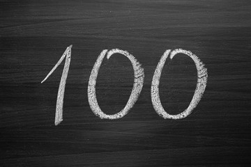 Wall Mural - number one hundred enumeration written with a chalk on the blackboard