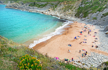 PLAYA DE SAN JULIAN, SPAIN - JULY 6, 2016: Unknown people on the