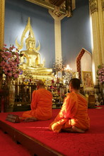Monks Praying And Giant Golden Statue Of The Buddha, Wat Benchamabophit (Marble Temple), Bangkok