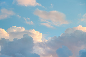 Wall Mural - blue sky with sunset clouds in autumn evening