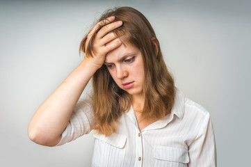 Wall Mural - Young disappointed woman in depression