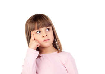 Pensive small girl with pink t-shirt