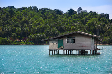 Paradise view on house on stilts in tropical country. Travel and vacation concept. Summer in Thailand