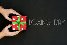 Woman With A Gift And Text Boxing Day